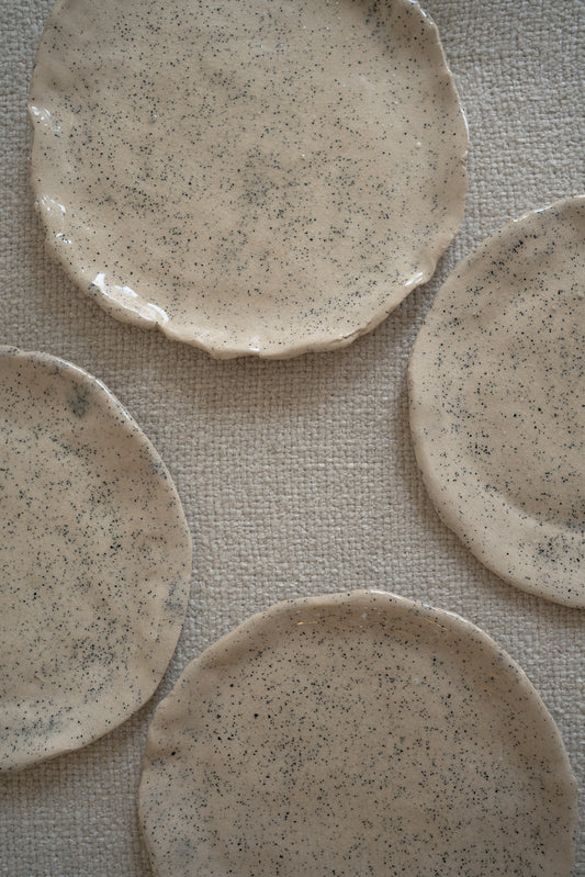 Set of 4 handcrafted speckled ceramic plates