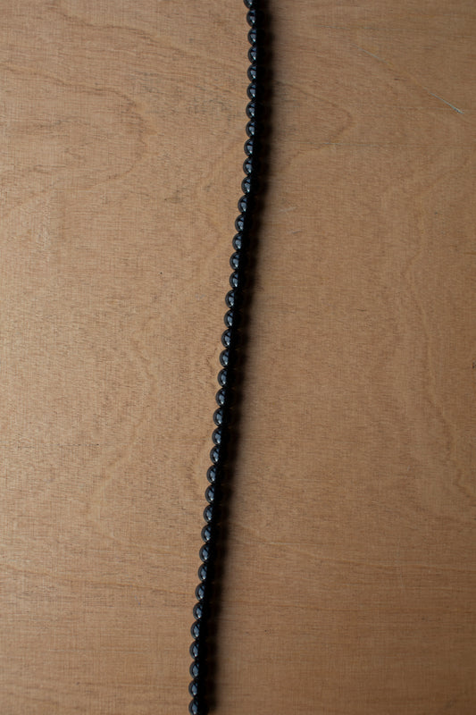 The Black Pebble String