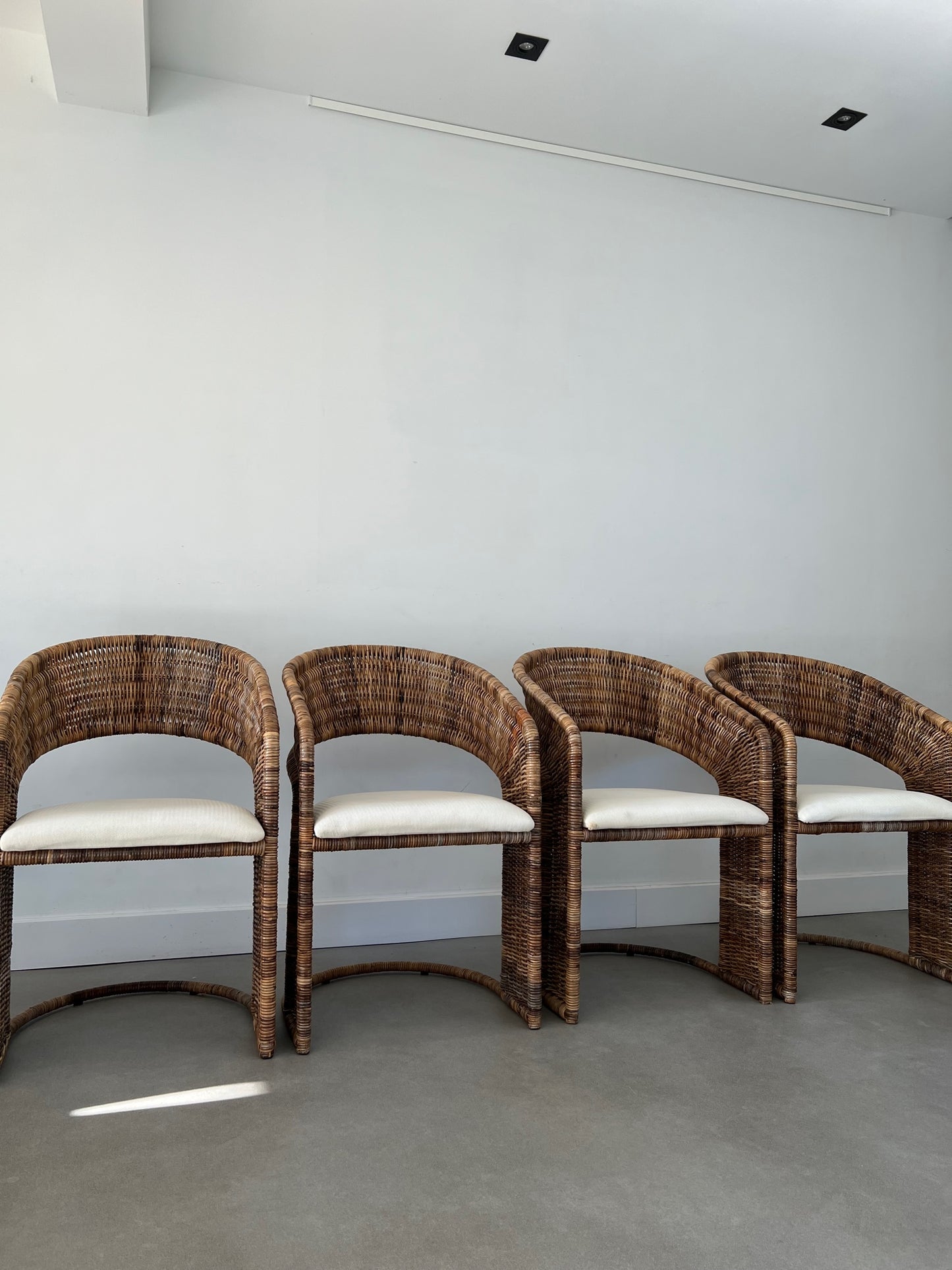 Set of 4 rattan/wicker chairs by Luit van der Helm 80's