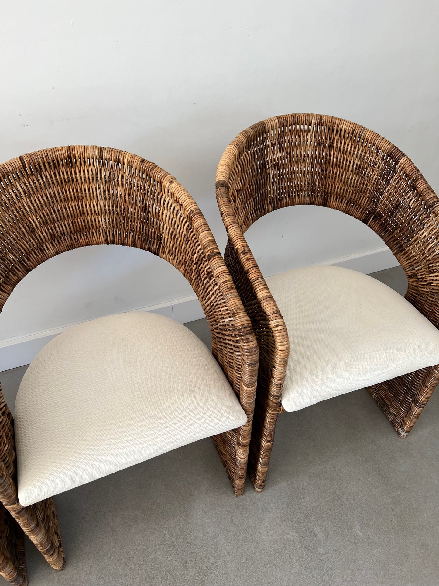 Set of 4 rattan/wicker chairs by Luit van der Helm 80's