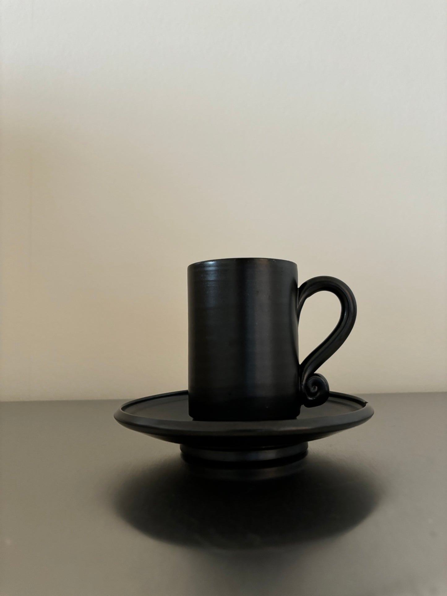 Black ceramic coffee cup