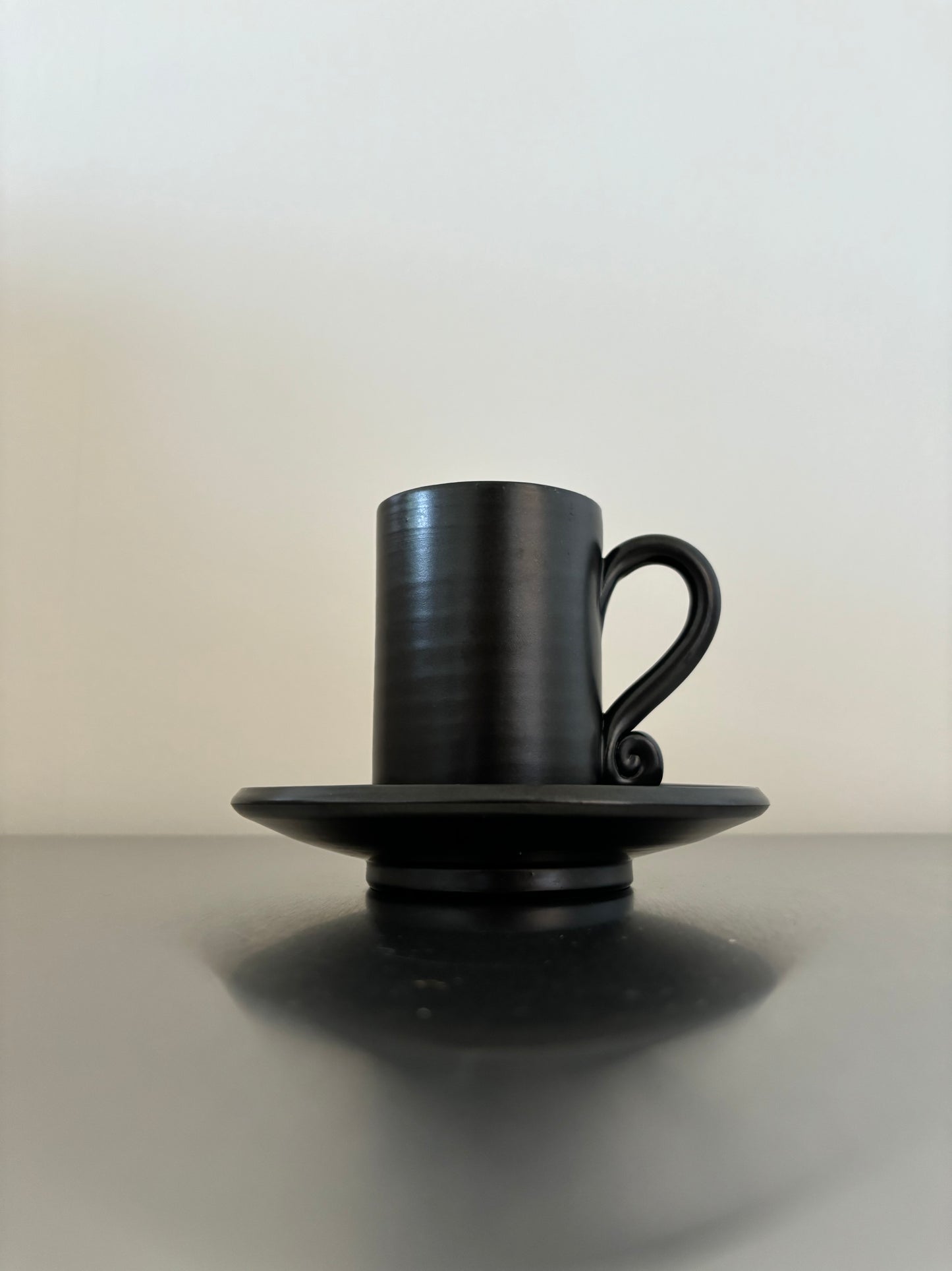 Black ceramic coffee cup