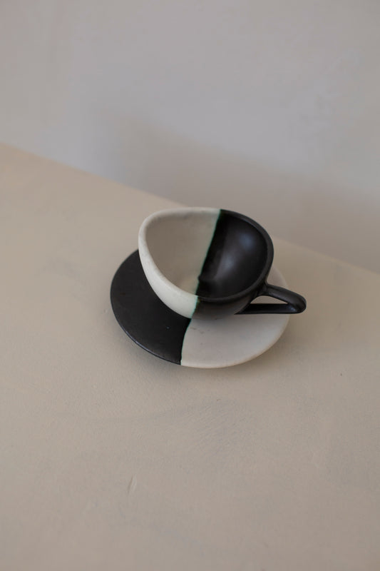 Sculptural black & white ceramic espresso cup