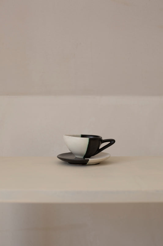 Sculptural black & white ceramic espresso cup