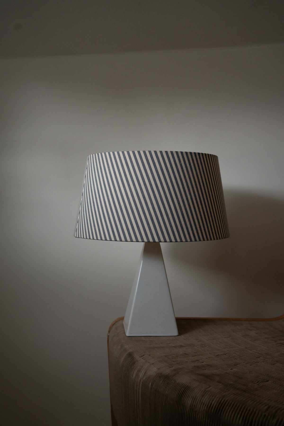 Obelisk ceramic lamp with blue striped shade
