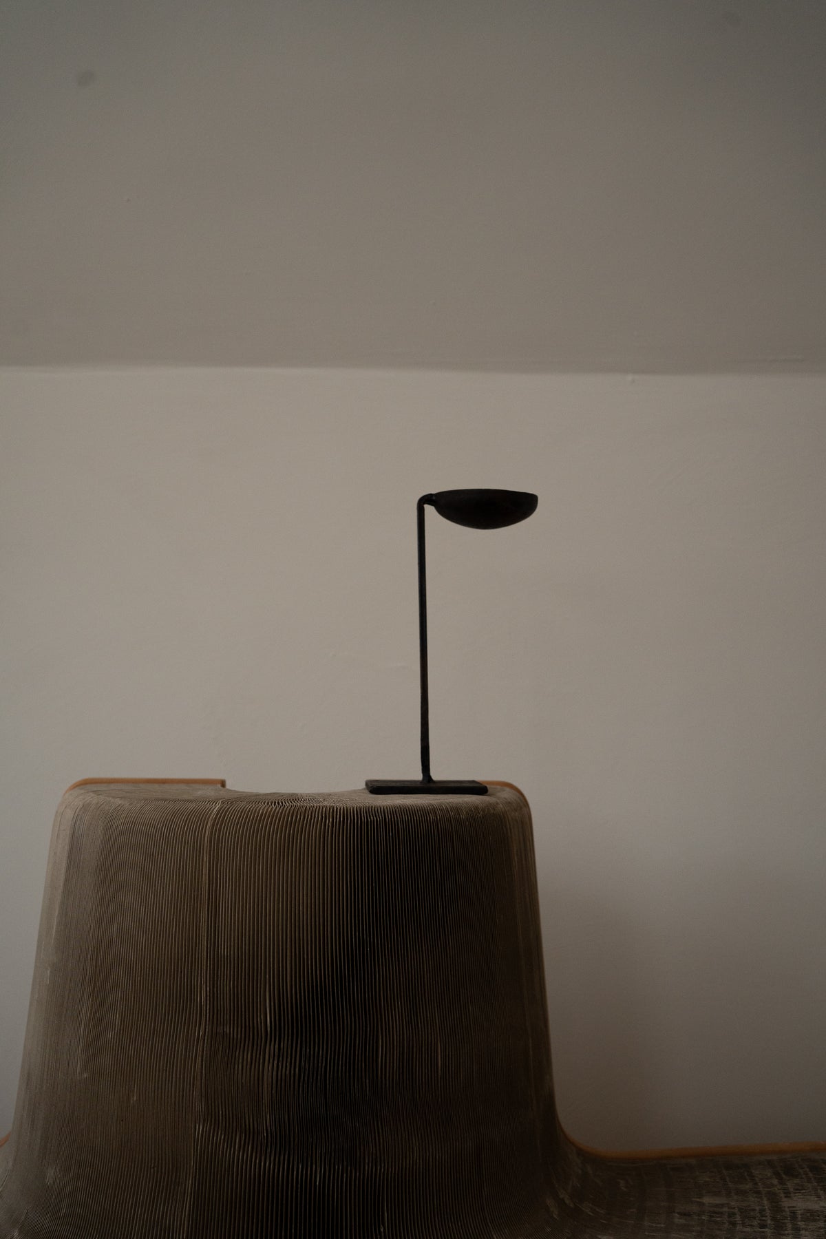 Minimalist wrought iron candle holder