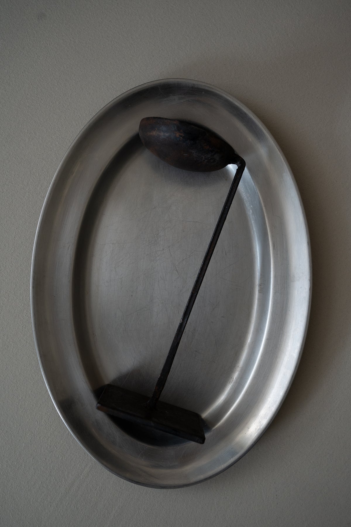 Minimalist wrought iron candle holder
