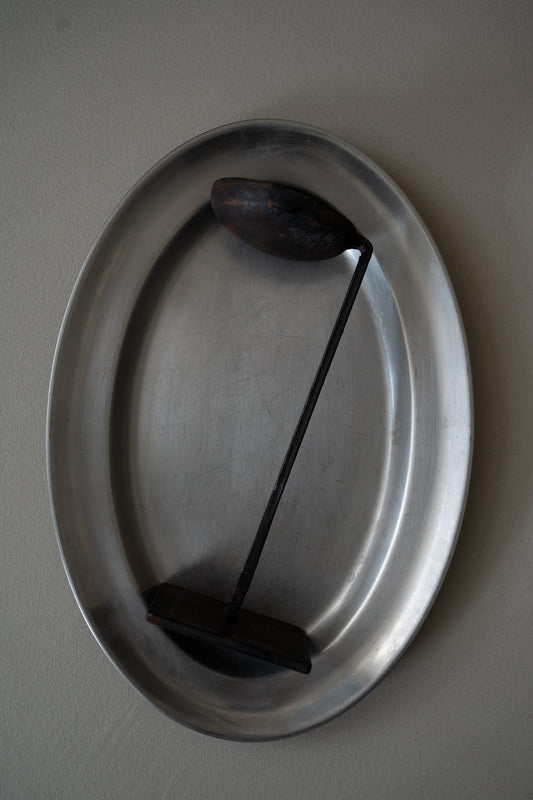 Minimalist wrought iron candle holder