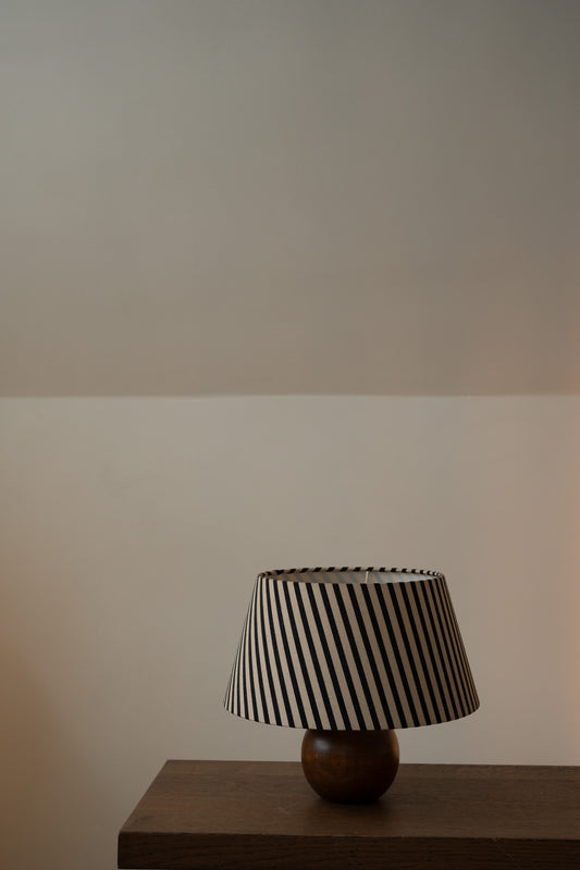 Vintage solid wood sphere table lamp with striped shade