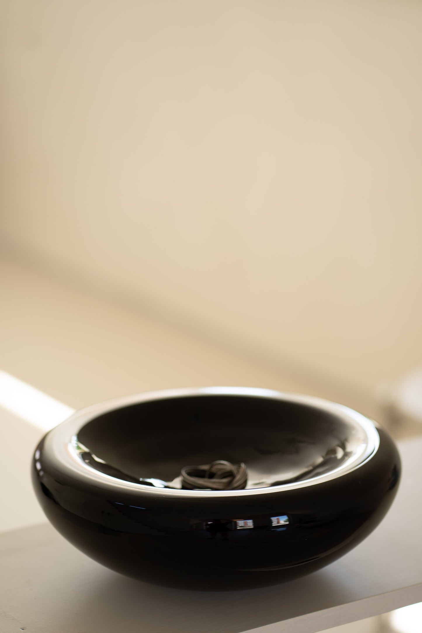 Chunky black glass bowl