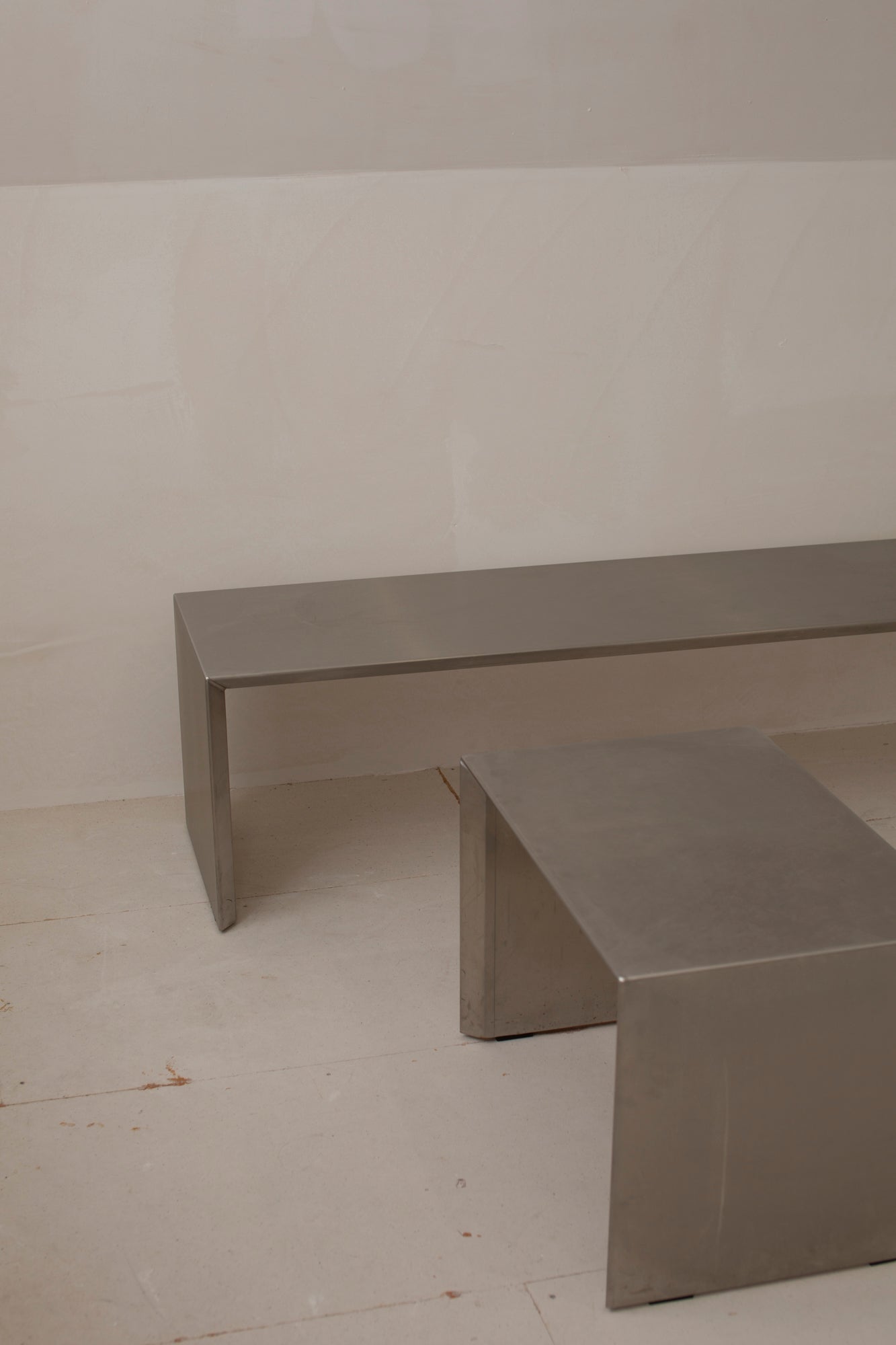 Set of 2 stainless steel benches / (side) tables