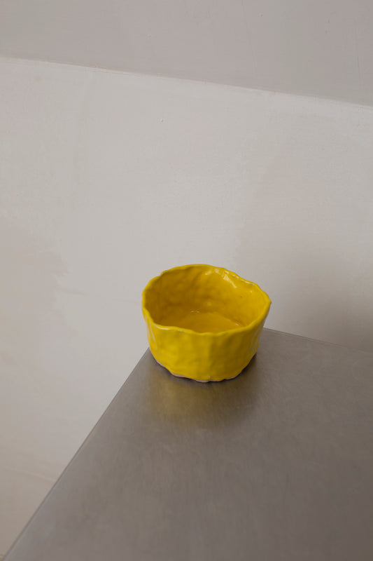 Bright yellow ceramic bowl