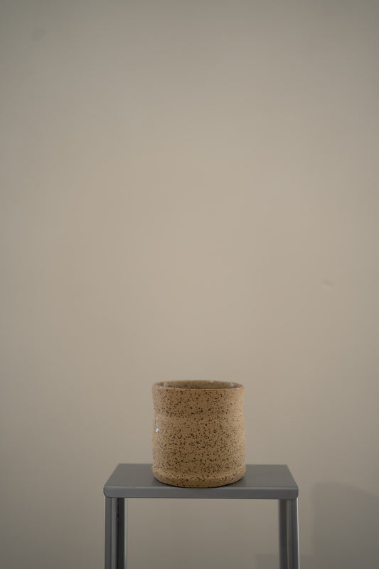Speckled ceramic coffee cup