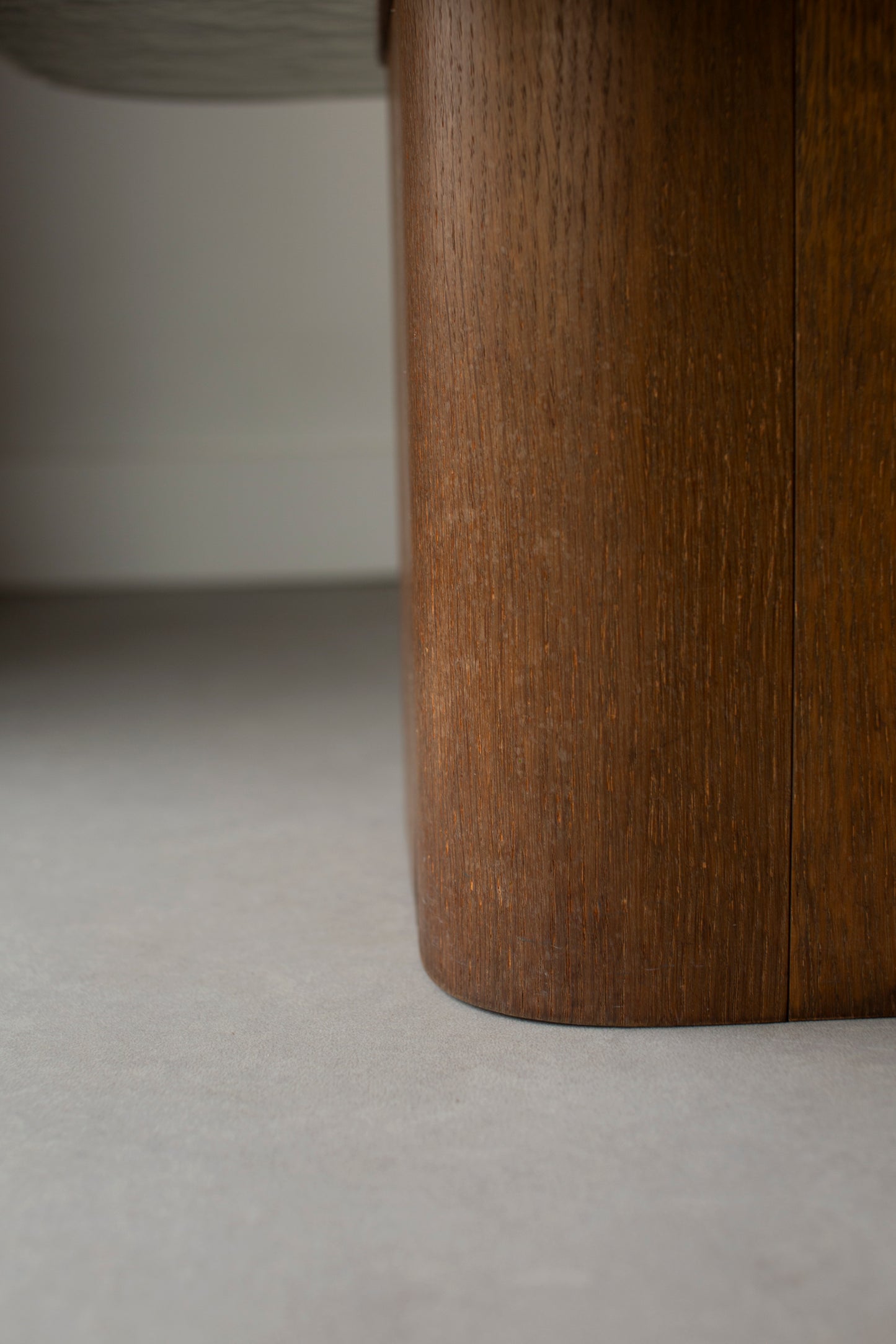 Heavy glass table on wooden pedestal