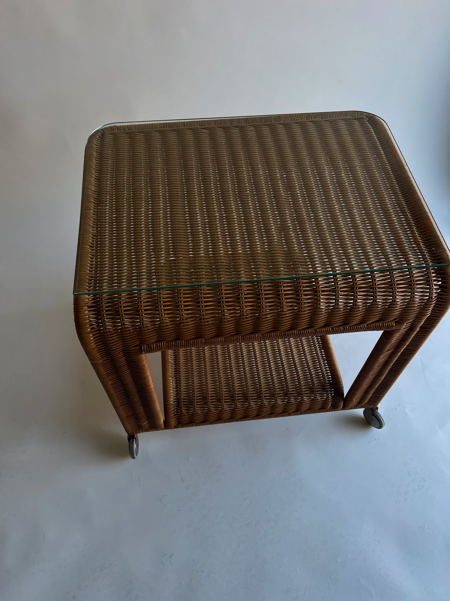 Vintage rattan trolley with glass top