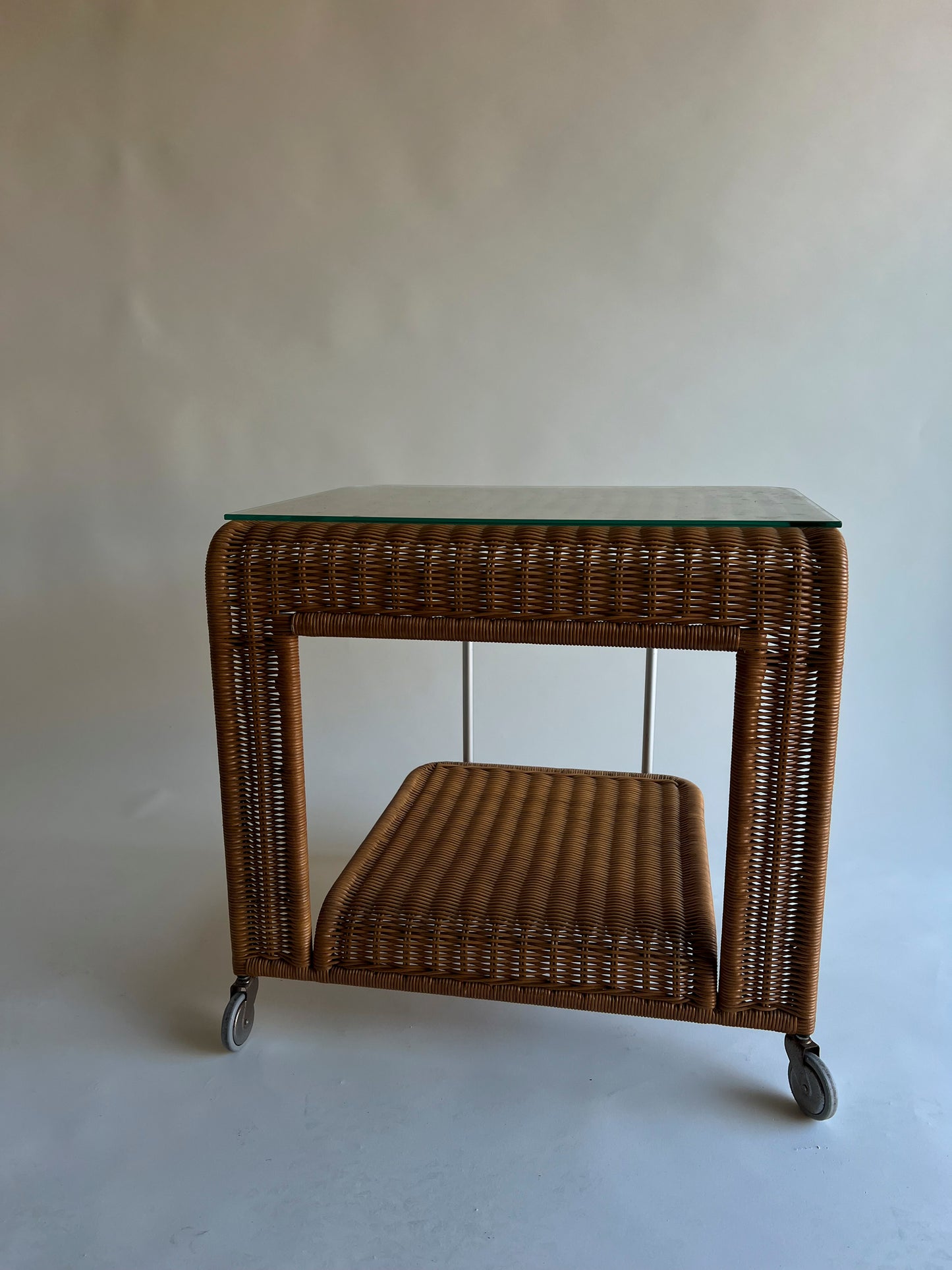 Vintage rattan trolley with glass top