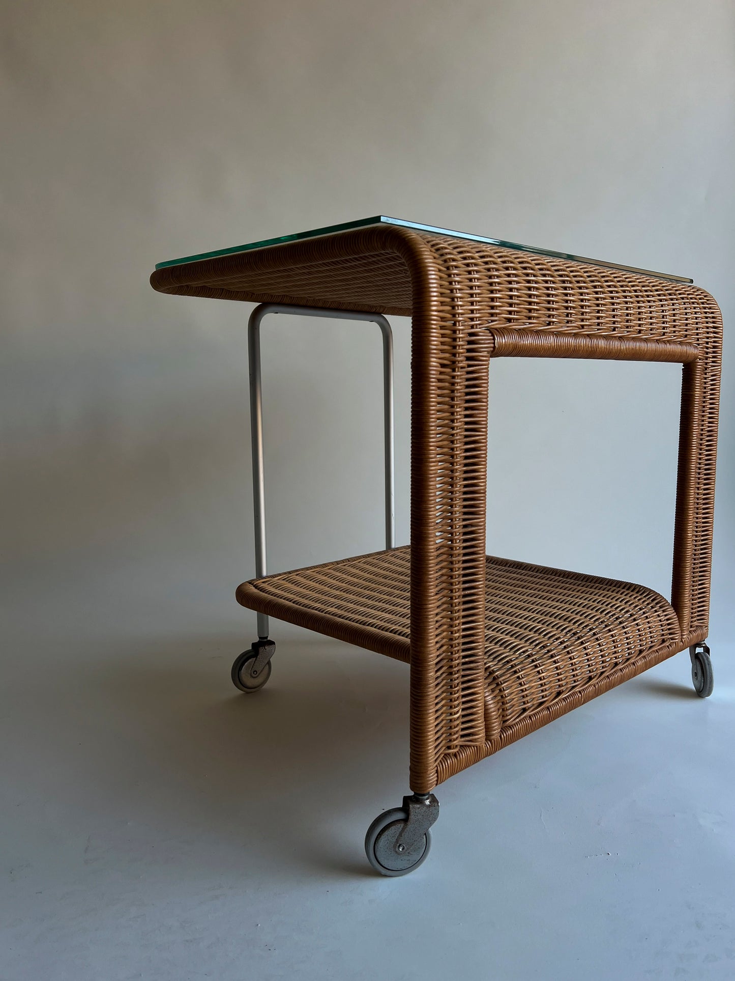 Vintage rattan trolley with glass top