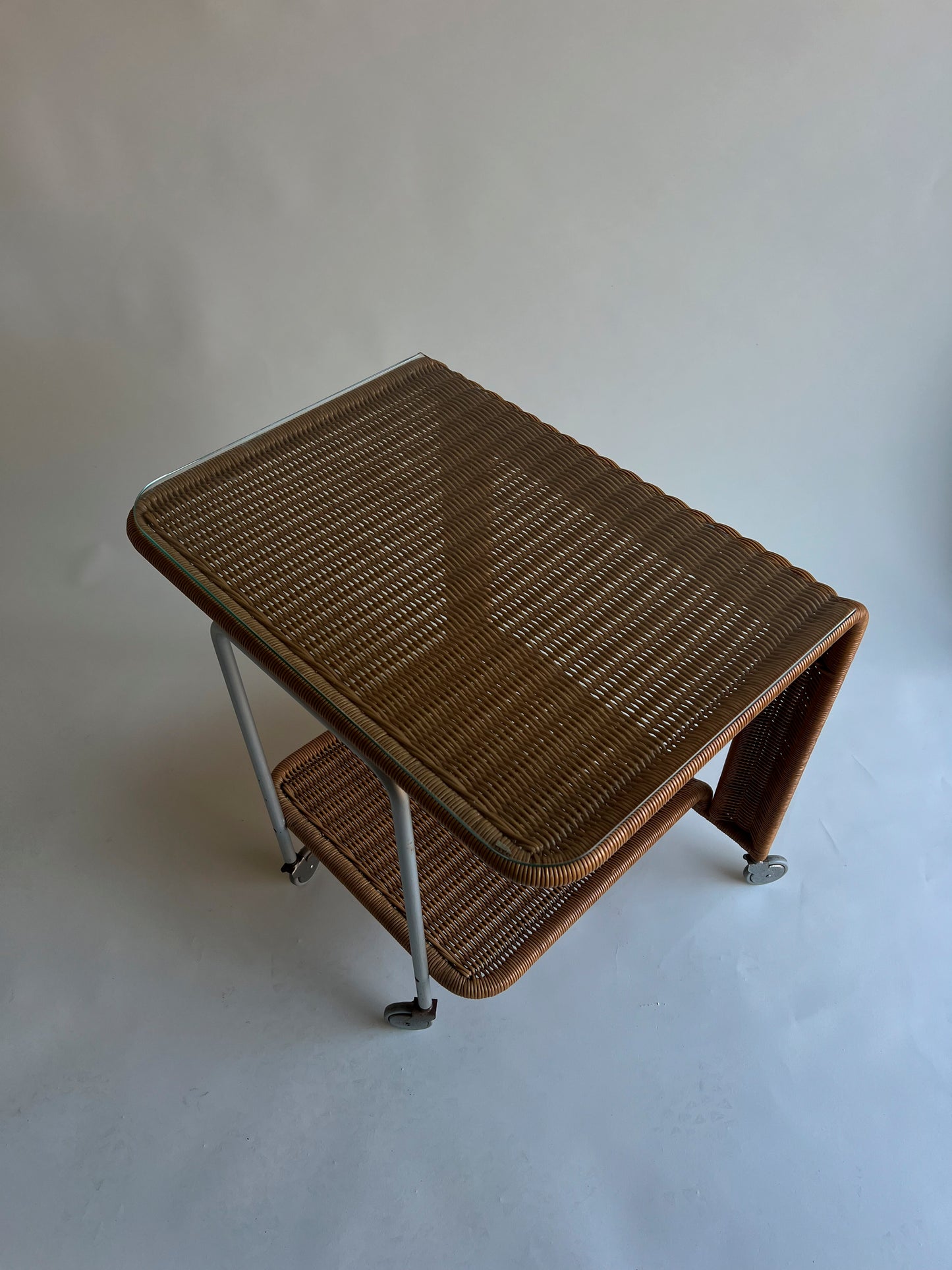 Vintage rattan trolley with glass top