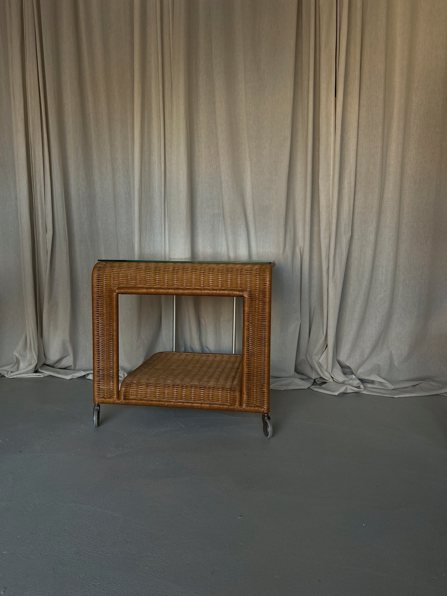 Vintage rattan trolley with glass top