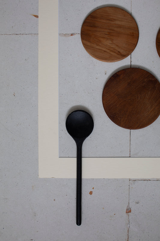 Black wooden spoon