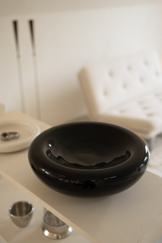 Chunky black glass bowl